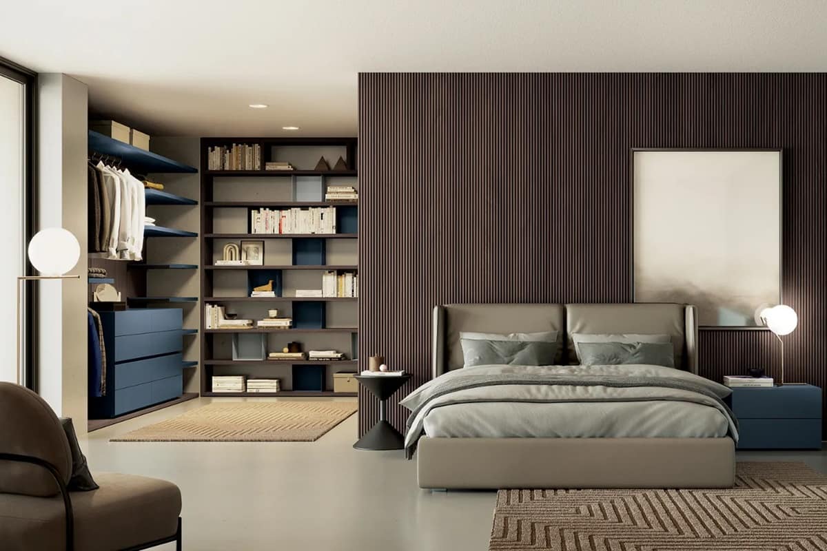 Camera matrimoniale completa con letto imbottito e cabina armadio angolare su misura