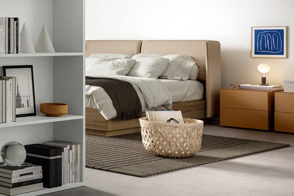 Letto contenitore con testata imbottita e giroletto in legno Nest
